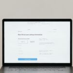 A laptop displaying an online checkout form, highlighting technology and e-commerce.