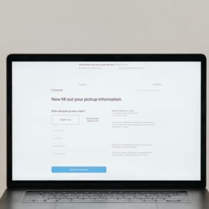 A laptop displaying an online checkout form, highlighting technology and e-commerce.